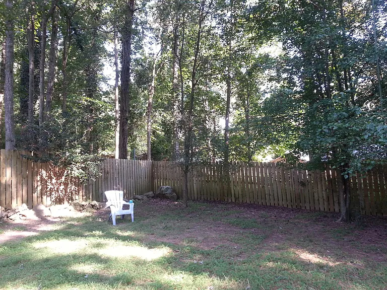 Large fenced back yard.