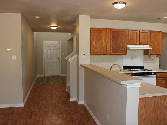 Looking towards the entry, notice the high ceiling in the foyer