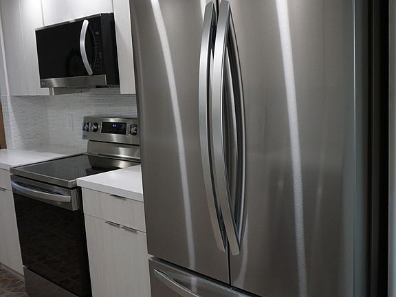 Kitchen with large fridge