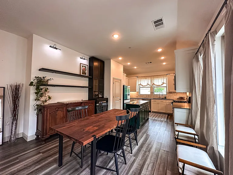 Dining room with hutch, open shelving, wine fridge