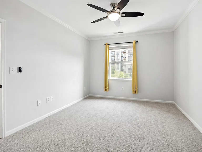Freshly painted, new carpet and remote controlled ceiling fan in master bedroom.