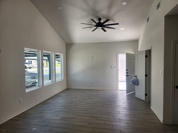 Open concept dining and living area to include ample storage spaces.