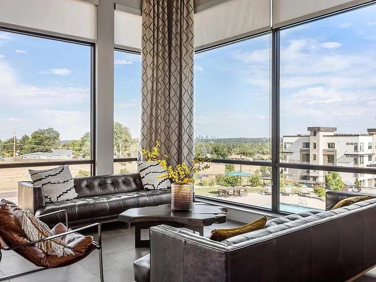 Lounge Area with Panoramic Windows and Modern Seating