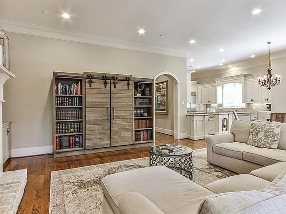 Family room offers seamless open flow into the kitchen and breakfast room.