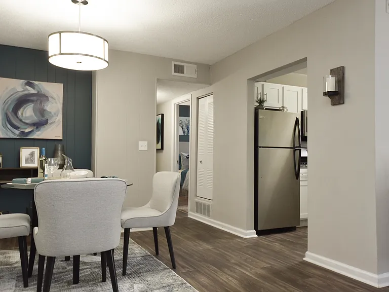 Experience modern elegance in this inviting dining and kitchen area.