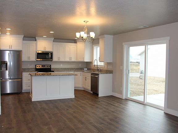 Kitchen/dining showing side doors/entrance to patio area