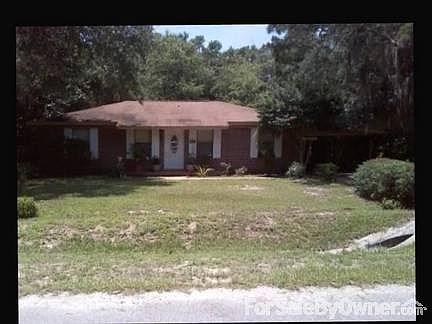 Road front of house
						:
						paved driveway, and covered car port