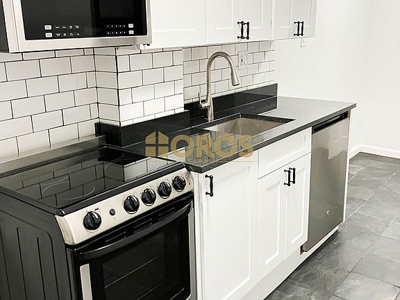 2nd image of 215 E 10th St