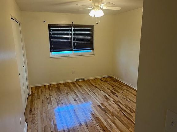 Main Bedroom w Hardwood Floors