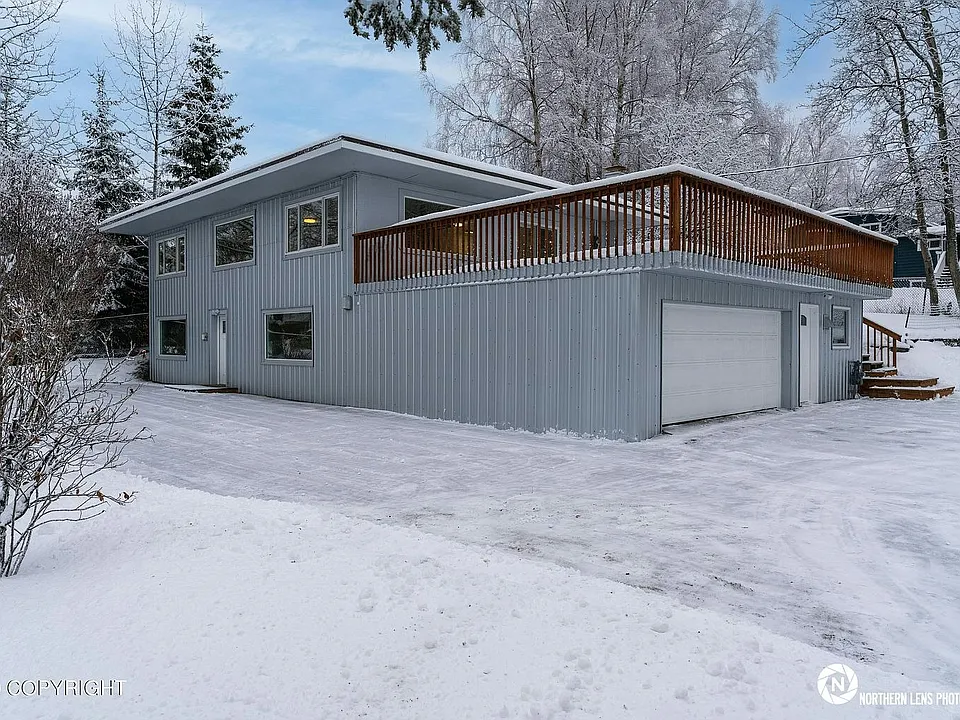 Unit 2 is the top floor of this spacious property that includes the garage-top deck and a private back yard at the top level included!