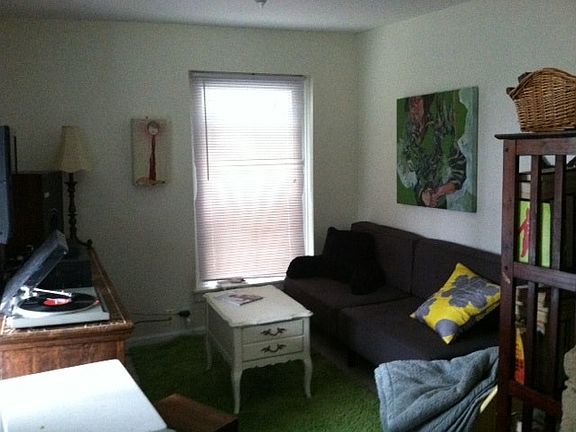 Living Room w/ former tenant's furniture