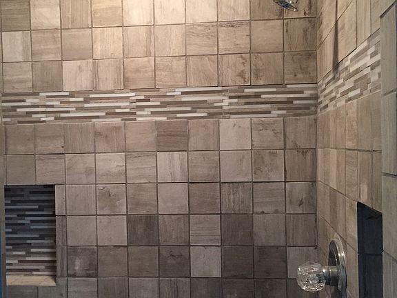 Newly tiled shower in MB