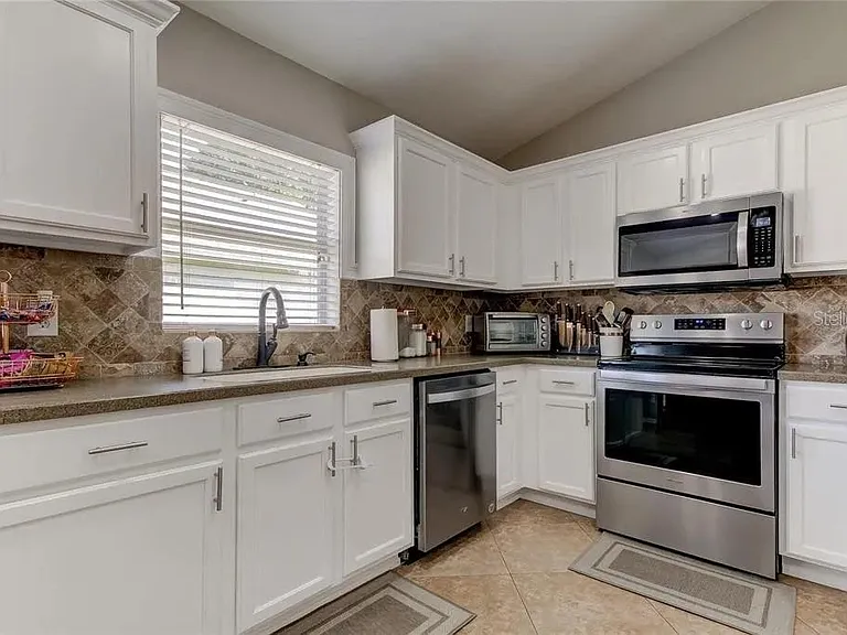 12213 Ravens Nest Pl — Photo 24