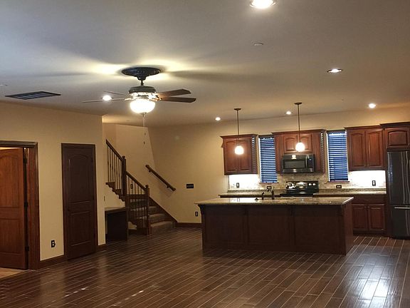 Large open Living-Kitchen-Dining Area with Guest bath.