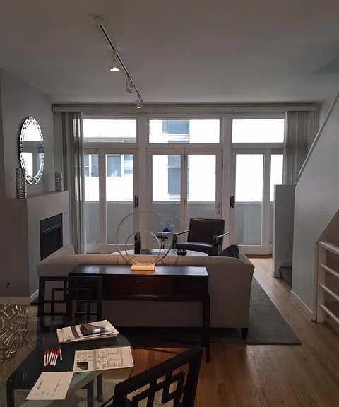 MAIN LEVEL--living room/dinig room COMBO adjacent private ba