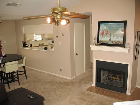 Living area, from corner, looking towards dining and kitchen