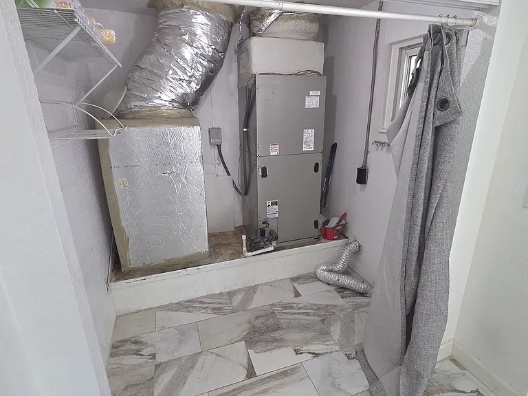 Second Living Room Space Washer/Dryer Area