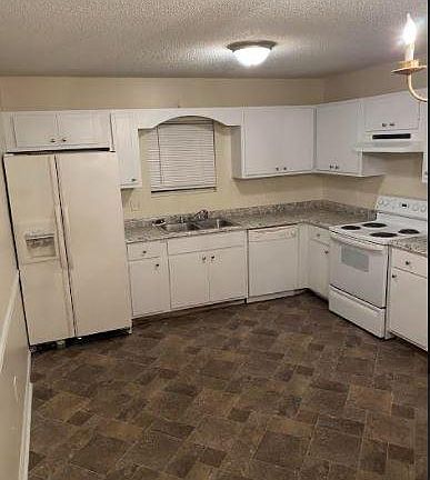Kitchen area with NEW fridge (not pictured)