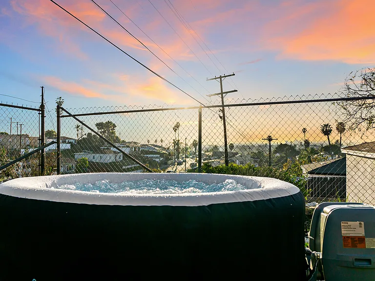 Relax in the hot tub with a stunning skyline view.