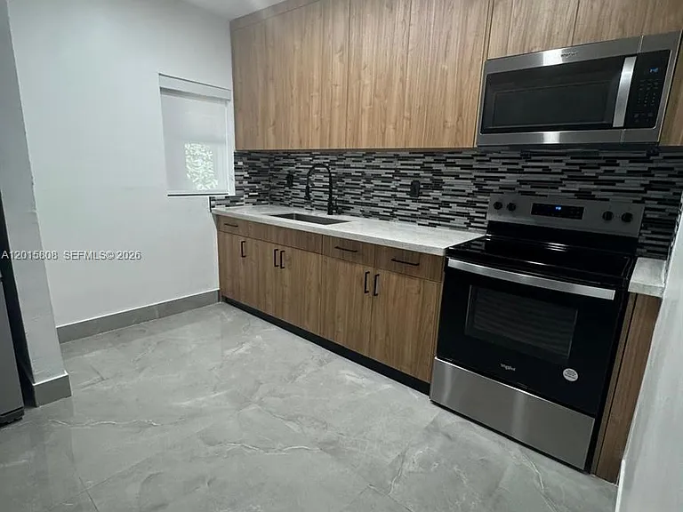 833 NW 75th St — Photo 8