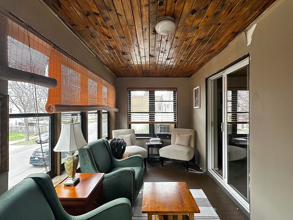 4 season porch with shaded tree cover