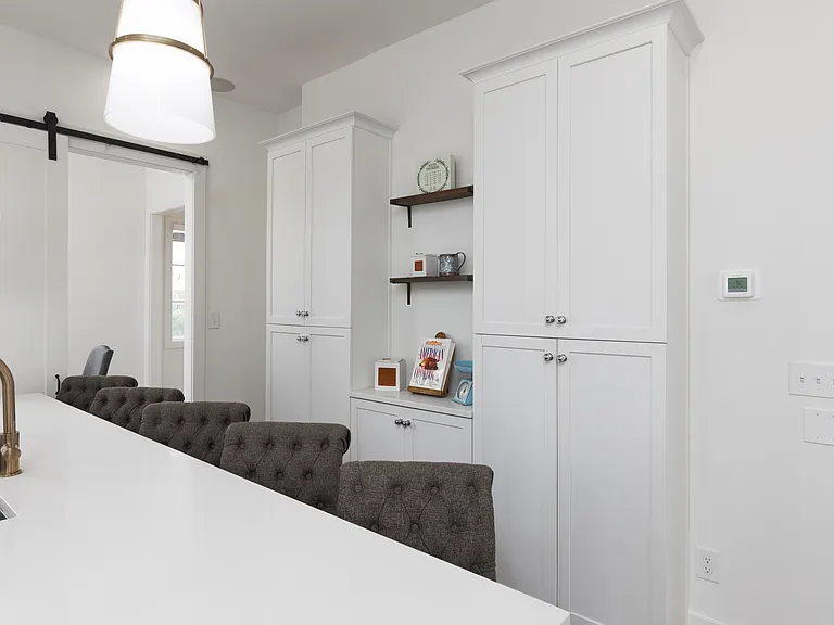 Fully equipped kitchen with stainless steel appliances, seating for 5 at the kitchen island, additional seating at the dining room table and all the dishware / utensils you might need.