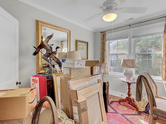 small bedroom, used as an office/storage