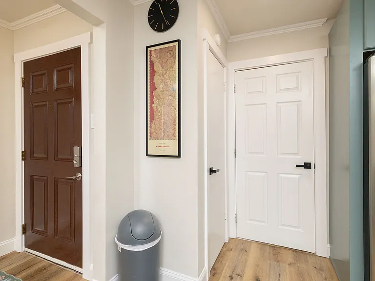Convenient entryway with direct access to the garage and a spacious pantry. Located just off the kitchen, this area makes storing groceries and unloading your car quick and easy.