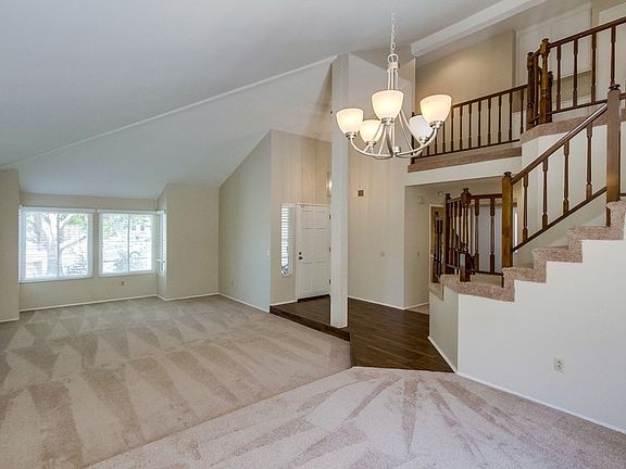 Dining Area + Living Room looking towards front door.