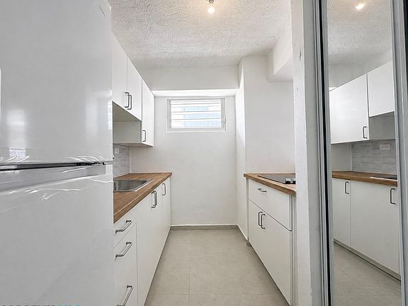 3rd image of 501 Modesta #1410