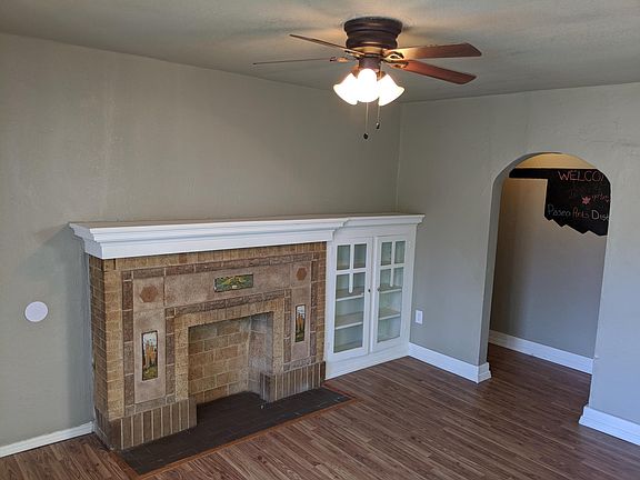 Living area with faux fireplace