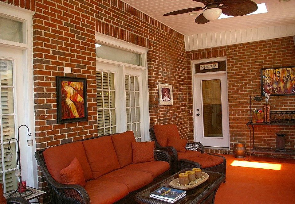 Relaxing days under fully screened back porch