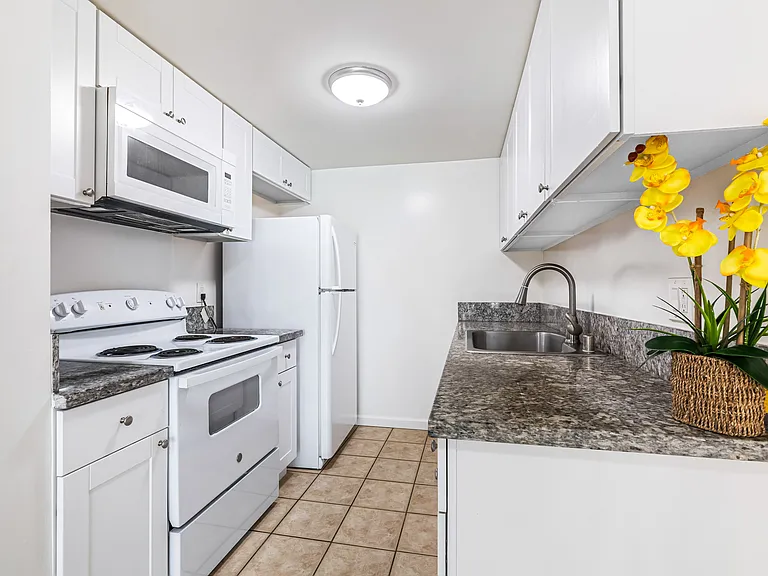 Newly renovated kitchen with granite countertops