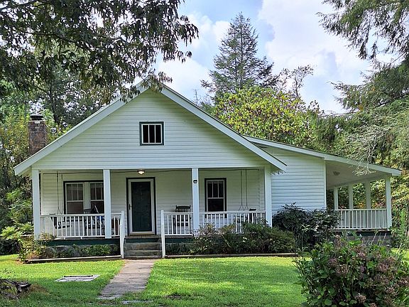 Front of Ol Farmhouse - 2 Rocking Chairs, & 2 Swings