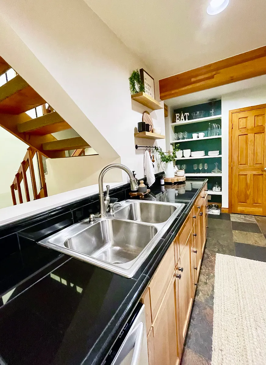 Kitchen with open shelving and pantry wall - 25 Mount Royal Dr