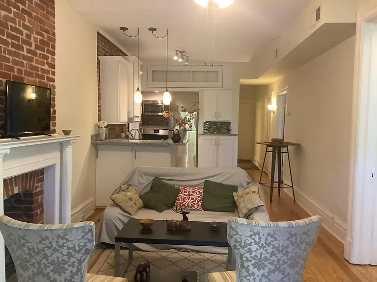 Living room dining room and kitchen area.