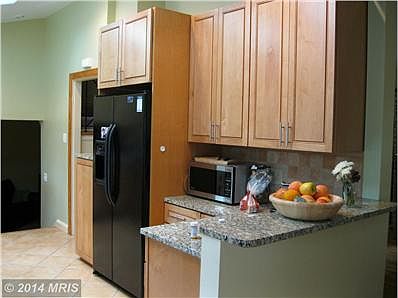 Opposite side of kitchen with great cabinets