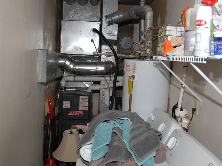 Main Floor Laundry & Utility 13' 4" x 4' 2"