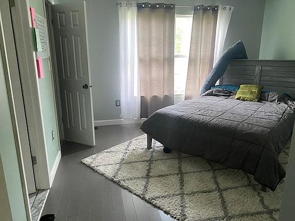 Master room with walk in closet and private bath