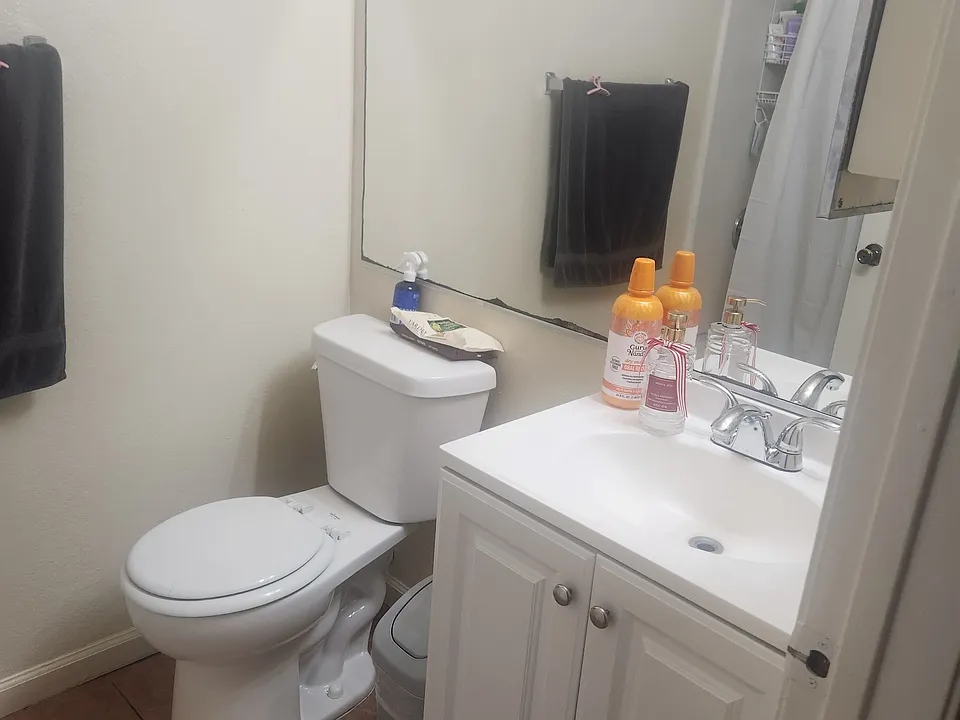 Bathroom with tub and shower combo