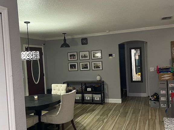 Dinning, entry way, hallway to the guest bedrooms and bath