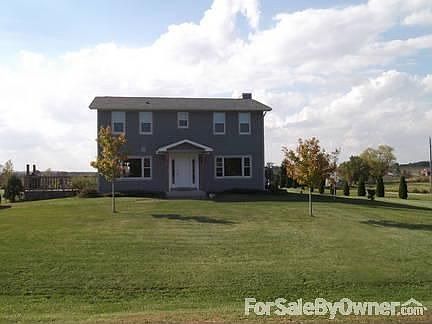 Landscaped property
						:
						Dozens of trees, shrubs and flowering bushes on property.