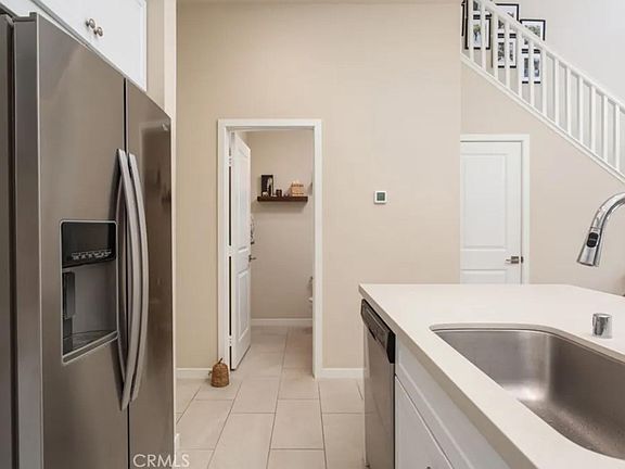 Hidden storage and a spacious powder room downstairs.