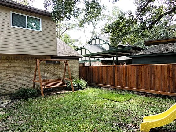 Backyard with new fencing.