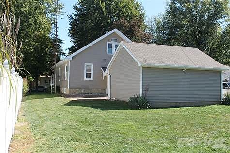 Detached 2 car garage and back yard!