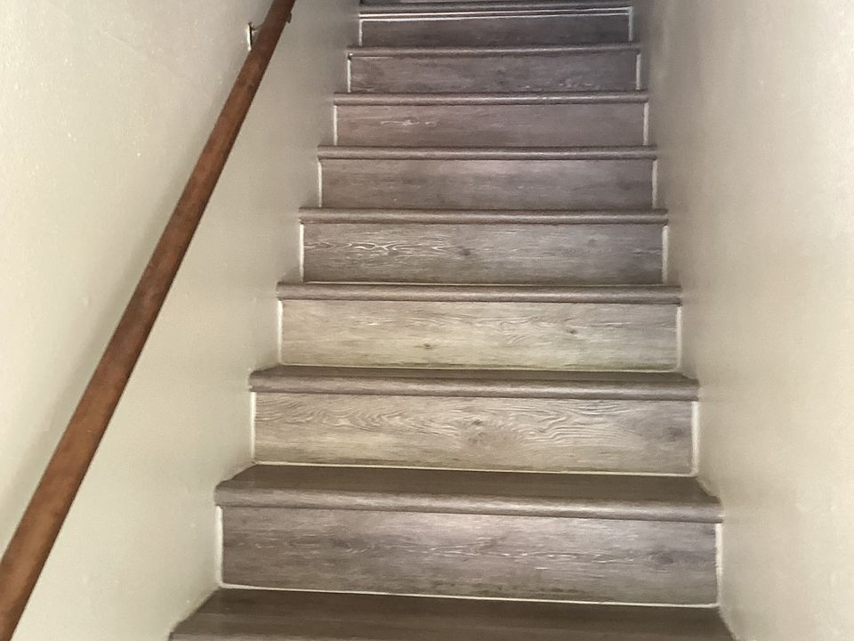 Upstairs from front door.