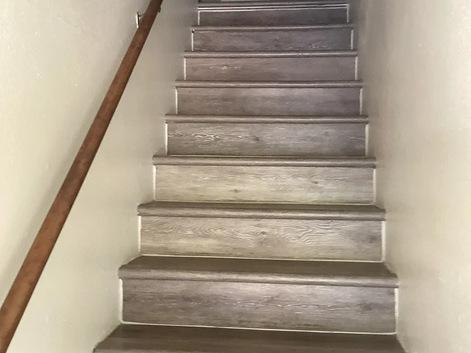 Upstairs from front door.