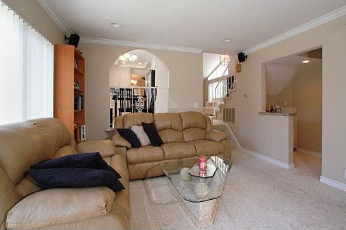 Open floor plan. Huge family room adjacant to Kitchen, wet bar, 1/2 bath.    