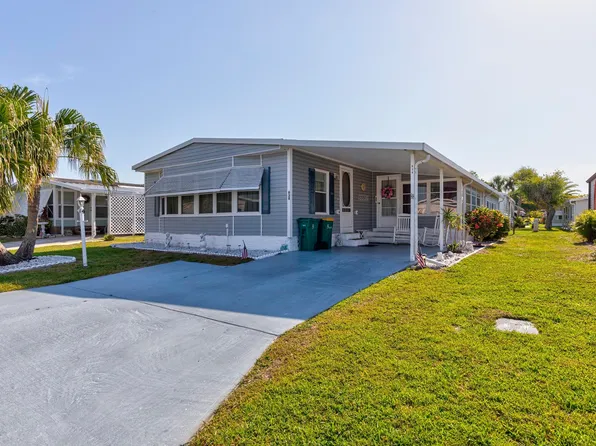 638 Hyacinth Cir, Barefoot Bay, FL 32976