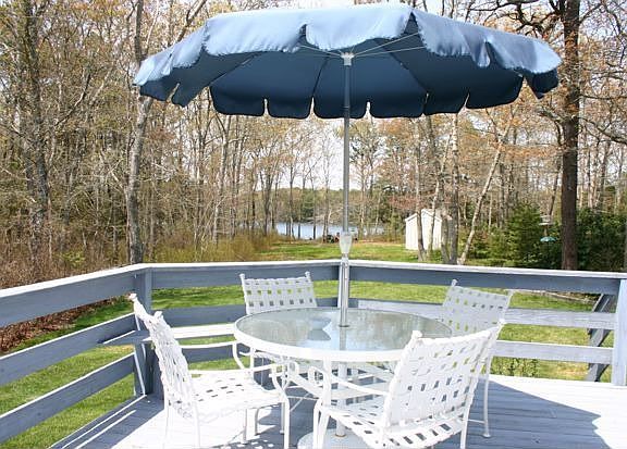 Nice deck opens from sun room and garage